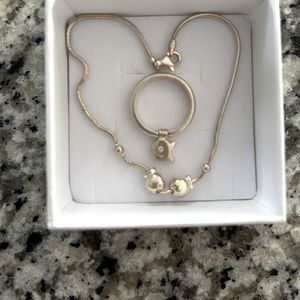 Clio Blue France,  sterling ring and bracelet with cute fish accents.